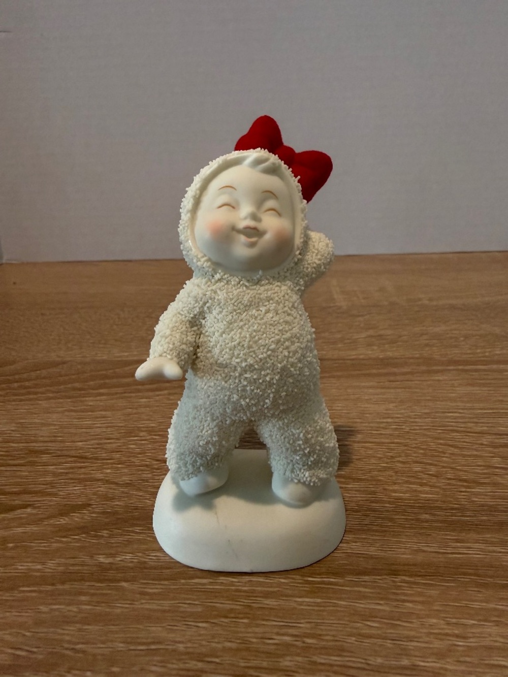Dept. 56 Snowbabies Star Quality Figurine Snow Baby with Red Bow
